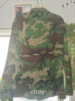 VTG U. S. Army Woodland Camouflage BDU Uniform Jacket/Shirt with U. S. ARMY Lot VTG U. S. Army Woodland Camouflage BDU Uniform Jacket/Shirt with U. S. ARMY Lot